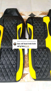 Cover Jok Truk Ragasa dengan desain hitam kuning terbuat dari bahan kulit sintetis dilengkapi dengan jahitan berpola cocok untuk interior mobil memberikan tampilan modern dan nyaman.