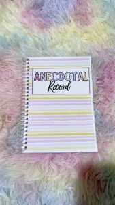Anecdotal Record Spiral Notebook with Pastel Stripes and Quote on Back