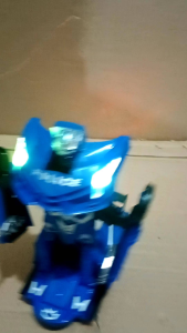 MAINAN MOBIL POLISI JADI ROBOT WARNA RANDOM