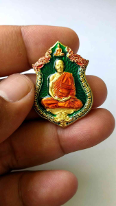 เหรียญหลวงพ่อทอง วัดบ้านไร่ รุ่นเศรษฐีพันล้าน เนื้อทองระฆัง ลงยา 3 สี พื้นเขียว