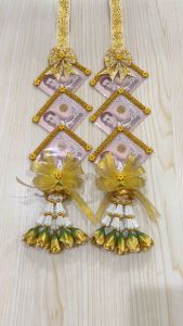 พวงมาลัยนาค พวงมาลัยคล้องคอนาค พวงมาลัยบ่าวสาว พวงมาลัยใส่แบงค์ ชายดอกไม้สีทอง ใส่แบงค์