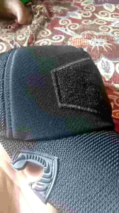 topi cowak hitam