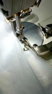 ตัวช่วยต่อตะเข็บสบงจีวรและตีนผีล้มตะเข็บจีวร