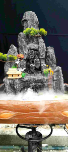 Hòn non bộ thác nước tiểu cảnh để bàn trang trí nhà cửa