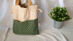 Drawstring lunchbag pouch reversible 2 way bag 4 pockets. Foldable bags for travel.