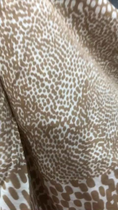 vải lanh họa tiết da beo màu nâu nhạt_( khổ 1m5) dày vừa mềm rũ mát may đầm váy áo vv