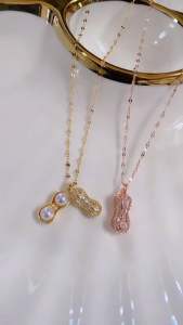 Kalung Titanium Kacang Gold CXA72