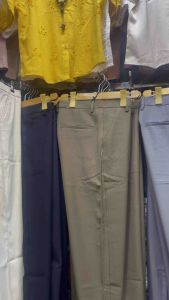 Straight cut trousers pants for Men and Women jeans offering a timeless and versatile look. • Material: Premium fabric that ensures a flowy and comfortable fit. • Buttons: Distinctive 4-button design adds a stylish and unique touch.