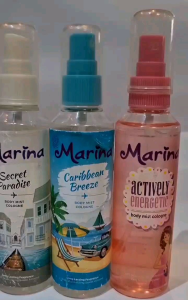 Marina body mist cologne set with faded labels and damage buy 1 get 1 free includes Friendly Confident Secret Paradise Caribbean Breeze and Acacia Enigma scents.