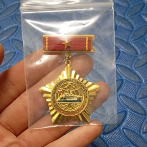 Kỷ niệm chương vì sự nghiệp phát triển ngành Thương Mại. huy hiệu thương mại Việt Nam