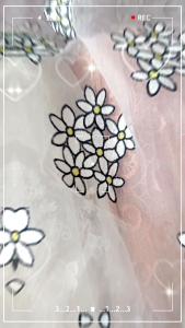 BAHAN ORGANZA BORDER MOTIF BUNGA .HARGA 0.50METER