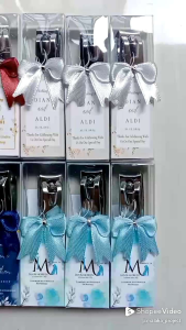 Isi 50 Pcs - Souvenir Gunting Kuku 777 Ukuran Besar Kemas Mika dan Hiasan Pita Cantik