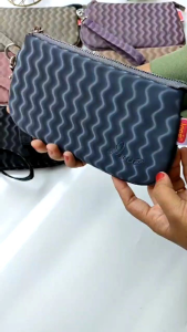 Madeena pouch by Inoe bahan chocoly wafe / pouch wanita terbaru dari Inoe motif cantik harga murah