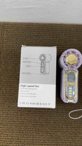 X699 High-speed fan with yellow button and digital display for speed control.