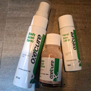 Oxecure no (BUY 1 TAKE 1) box! Body acne spray Acne clear potion Facial acne lotion