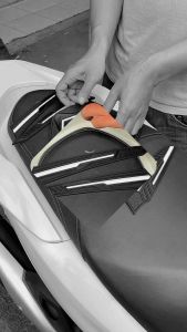 Upper Stop Lamp PCX 150 & Aksesoris Karpet Motor Matic\\n\\n Mengenal Bahan Karet Motor\\n\\nKaret merupakan salah satu bahan penting pada motor matic, terutama pada bagian-bagian yang membutuhkan kekuatan elastis dan tahan lama. Karet memiliki peran penting dalam menjamin kenyamanan berkendara serta keamanan pengendara.\\n\\n Peran Karet pada Motor Matic\\n\\nKaret digunakan pada berbagai komponen motor matic, seperti ban, rem, dan suspensi. Selain itu, karet juga digunakan pada berbagai aksesoris motor, seperti karpet motor.\\n\\n Jenis-Jenis Bahan Karet Motor\\n\\nAda beberapa jenis bahan karet yang digunakan pada motor matic, antara lain:\\n\\n* Natural Rubber (Karet Alam)\\n* Synthetic Rubber (Karet Sintetis)\\n* Neoprene\\n\\n Cara Merawat Bahan Karet Motor\\n\\nUntuk menjaga kualitas bahan karet motor, lakukan perawatan secara rutin, seperti membersihkan dengan air bersih dan sabun, menghindari paparan sinar matahari langsung, serta mengganti komponen karet yang sudah aus.\\n\\n Suku Cadang Motor PCX\\n\\nSuku cadang motor PCX adalah komponen-komponen yang dapat diganti atau diperbaiki untuk memastikan kinerja motor tetap optimal. Berikut ini adalah informasi terkait suku cadang motor PCX:\\n\\n Jenis-Jenis Suku Cadang Motor PCX\\n\\nAda berbagai jenis suku cadang motor PCX, seperti:\\n\\n* Ban\\n* Rem\\n* Karburator\\n* Aki\\n\\n Cara Memilih Suku Cadang Motor PCX yang Berkualitas\\n\\nUntuk memilih suku cadang motor PCX yang berkualitas, pastikan untuk membeli dari toko resmi atau terpercaya, memperhatikan garansi dan jaminan kualitas, serta membandingkan harga dan spesifikasi produk.\\n\\n Cara Mengganti Suku Cadang Motor PCX\\n\\nProses penggantian suku cadang motor PCX dapat dilakukan sendiri atau dengan bantuan teknisi profesional. Pastikan untuk mengikuti petunjuk manual atau panduan yang disediakan oleh produsen.\\n\\n Upper Stop Lamp PCX 150\\n\\nUpper stop lamp PCX 150 adalah komponen tambahan yang dipasang pada bagian atas motor untuk meningkatkan visibilitas dan keamanan saat berkendara.\\n\\n Fungsi Upper Stop Lamp PCX 150\\n\\nUpper stop lamp PCX 150 memiliki fungsi utama untuk memberikan tanda kepada pengendara lain bahwa motor sedang berhenti atau melambat. Hal ini dapat membantu mencegah tabrakan dan meningkatkan keamanan berkendara.\\n\\n Cara Memasang Upper Stop Lamp PCX 150\\n\\nProses pemasangan upper stop lamp PCX 150 dapat dilakukan dengan mengikuti langkah-langkah berikut:\\n\\n1. Cabut kabel negatif aki\\n2. Pasang bracket pada bagian atas motor\\n3. Hubungkan kabel upper stop lamp ke sumber listrik\\n4. Pasang lampu pada bracket\\n5. Uji coba kinerja lampu\\n\\n Tips Merawat Upper Stop Lamp PCX 150\\n\\nUntuk menjaga kualitas upper stop lamp PCX 150, lakukan perawatan rutin seperti membersihkan dengan kain lembut, menghindari paparan sinar matahari langsung, serta mengganti komponen yang sudah aus.\\n\\n Aksesoris Karpet Motor Matic\\n\\nAksesoris karpet motor matic adalah pelapis lantai yang dipasang pada bagian dalam motor untuk meningkatkan kenyamanan dan keamanan pengendara.\\n\\n Jenis-Jenis Aksesoris Karpet Motor Matic\\n\\nAda berbagai jenis aksesoris karpet motor matic, seperti:\\n\\n* Karpet standar\\n* Karpet custom\\n* Karpet waterproof\\n\\n Cara Memasang Aksesoris Karpet Motor Matic\\n\\nProses pemasangan aksesoris karpet motor matic dapat dilakukan dengan mengikuti langkah-langkah berikut:\\n\\n1. Hapus karpet lama\\n2. Bersihkan area pemasangan\\n3. Pasang karpet baru pada area yang telah dibersihkan\\n4. Uji coba kinerja karpet baru\\n\\n Tips Merawat Aksesoris Karpet Motor Matic\\n\\nUntuk menjaga kualitas aksesoris karpet motor matic, lakukan perawatan rutin seperti membersihkan dengan air bersih dan sabun, menghindari paparan sinar matahari langsung, serta mengganti komponen yang sudah aus.\\n\\n Aksesoris Motor Berkualitas\\n\\nAksesoris motor berkualitas adalah komponen tambahan yang dapat meningkatkan kinerja dan keamanan motor.\\n\\n Ciri-Ciri Aksesoris Motor Berkualitas\\n\\nAksesoris motor berkualitas memiliki ciri-ciri sebagai berikut:\\n\\n* Terbuat dari bahan yang tahan lama dan kuat\\n* Memiliki desain yang ergonomis dan mudah dipasang\\n* Memiliki garansi dan jaminan kualitas\\n\\n Cara Memilih Aksesoris Motor Berkualitas\\n\\nUntuk memilih aksesoris motor berkualitas, pastikan untuk membeli dari toko resmi atau terpercaya, memperhatikan garansi dan jaminan kualitas, serta membandingkan harga dan spesifikasi produk.\\n\\n Keuntungan Menggunakan Aksesoris Motor Berkualitas\\n\\nMenggunakan aksesoris motor berkualitas dapat memberikan berbagai keuntungan, seperti:\\n\\n* Meningkatkan kinerja motor\\n* Meningkatkan keamanan berkendara\\n* Meningkatkan nilai jual motor\n}