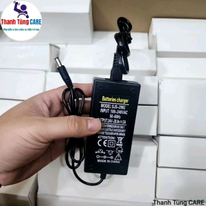 Sạc xe điện trẻ em 24V xe F1 chân tròn DC  Sạc 24V ắc quy