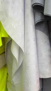 ผ้ายืด ผ้ามัน ลายแอสซิส หน้ากว้าง 74นิ้ว ผ้าเมตร ผ้าตัด เสื้อกีฬา