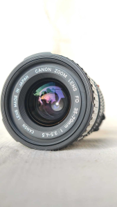 เลนส์มือหมุน Canon zoom fd 35-70 mm. F3.5-4.5(22) Mount NFD พร้อมฟิลเตอร์ หน้า ท้าย