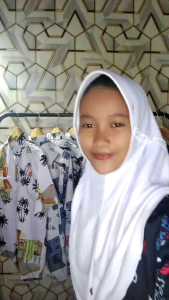 kemeja Pantai motif lilivoly merah dan biru