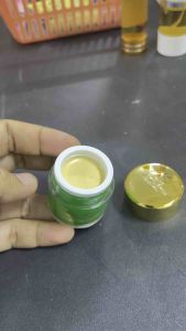 GLOW GLOWING DAY LOOSE Skin Care Set - Creamy texture compact size gold lid retail display beauty product.