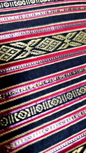 ม่านเมืองน่านจับเซ็ทผ้าพื้นตัดเสื้อสีเเดงตัด1ชุด