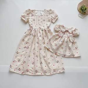 (4-64kg) Đầm Váy Mẹ Và Bé Hoa Nhí NHÍM XÙ KIDS Chất Đũi Xốp Cho Bé Gái Sơ Sinh - 8 Tuổi V069