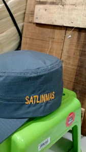 TOPI KOMANDO LINMAS