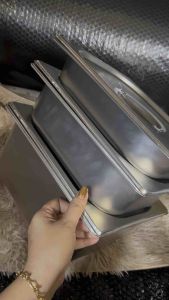Stainless steel half-size gastronorm food pans 1/2x6" 1/2x4" 1/2x2" for buffet warmers.
