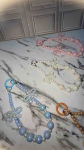 Jette Bow Phonestrap: Lanyard Handphone Handmade & Tali Gantungan HP Pita Coquette Glossy Beads Manik Strap Tali Handphone Lanyard Phone Strap Ribbon Bowknot Handmade Fashion
