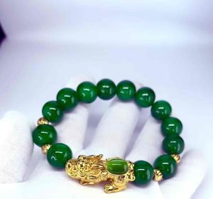 SPECIAL GREEN JADE WITH CHARM ( Stone of fortune )