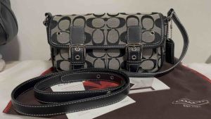 Like new/unused vintage 6844 complete double buckle cross body sling bag