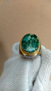 CINCIN FIRUS IRAN AAA Natural Tourquoise Ring with GIL Certificate 45.40 Ct Oval Cabochon Greenish Blue No Treatment Detected Set in Gold Band.