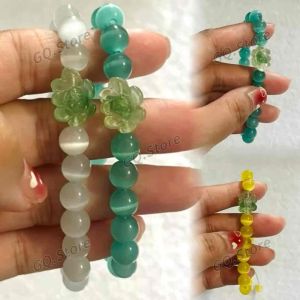 Vòng Tay Đá Mắt Mèo Phối Hoa Sen – Handmade Đan Tay Dễ Thương Mang Lại Bình An & May Mắn