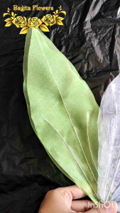 Dekorasi Pelaminan dengan Daun Tangkai Pipa Elastis & Bunga Hias