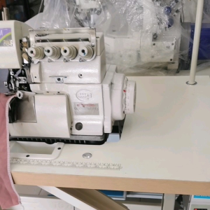 Used Pegasus overlock sewing machine (New Direct drive motor)