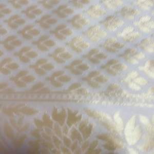 Traditional Kanchipuram Zari Silk Cream color weaving saree. With lovely self weaving in all saree and Pallu WEAVING at its finest and most classic