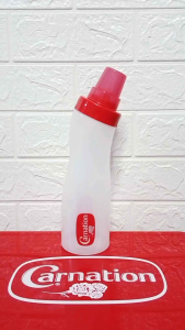 ขวดบีบ 750 ML กว้าง 7.5 CM สูง 29 CM ฝาปิด ฝาขวดใช้ตวงได้ (1 ฝา = 60 ML)