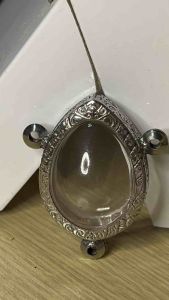 กรอบพระ ทรงเบี้ยแก้3หู หลวงปู่ศิลา สแตนเลสแกะสลักแบบเรียบและลายไทย กรอบพระเครื่อง กรอบพระสำเร็จ ตลับพระ