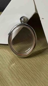 กรอบพระ ทรงเหรียญวงรีไม่มีหู สแตนเลสแกะสลักแบบเรียบและลายไทย กรอบพระเครื่อง กรอบพระสำเร็จ ตลับพระ