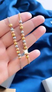 Gelang Serut Titanium Bola Mix Gold & Silver CXB434