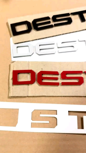 Emblem Hood Kap Mesin Mitsubishi Destinator 2025 2026 2027 UP Hitam Chrome Merah