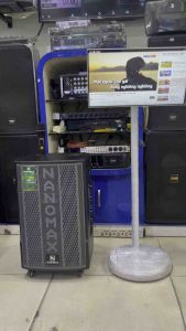 Loa di động karaoke có bánh xe Nanomax 12x5 bass 30cm công suất max 400W kèm 2 micro.