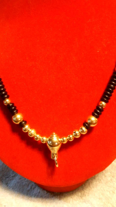 สร้อยคอห้อยพระ สร้อยกะลาตาเดียวแต่งด้วยปล้งทองเลเซอร์สวยงามแบบลงตัว