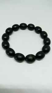 gelang kayu kelor hitam motif oval h181