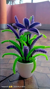 Lily flower with lavender in a pot with cover perfect for souvenirs decorations gifts for mothers day for center tables and many more occasions. A flower that never fades and a memorable gifts as well.