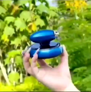 parfum pajangan dashboard mobil motif rocket putar tenaga surya