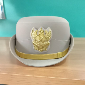 หมวกหม้อตาลข้าราชการหญิงสีกากีหน้าครุฑปักดิ้นทอง พร้อมซองหมวกกันเปื้อน