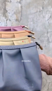 Amira Pouch: Dompet Wanita Motif Lipat & Praktis