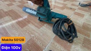 Cưa xích siêu tốc Makita hàng bãi xài điện 100 volt